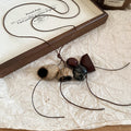 Brown Beaded Cord Necklaces with Botanical Pendants view 7