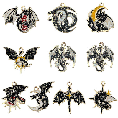 Black insect charms pictured with visible surface details