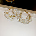 White Floral Pearl Cluster Hoop Earrings in Gold Tone view 6