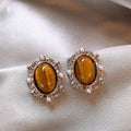 Amber Brown Stone Earrings in Twenty Eight Distinct Designs view 1