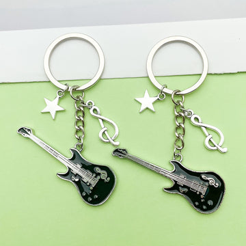 Guitar, Microphone and Saxophone Charm Keychains in 11 Pictured Variations