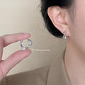 Twisted Mesh Huggie Hoop Earrings Gold Silver Pair view 2