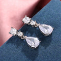 Three-Stone Pear-Shaped Long Drop Earrings In Polished Silver Tone view 4