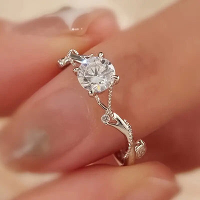 Product view showing rose stem round clear solitaire ring