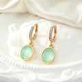 Gold Tone Pale Green Oval Stone Necklace and Huggie Earrings view 3