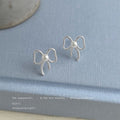 Silver Outline Bow White Pearl Center Stud Earrings Pair Style view 3