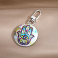 Silver Tone Round Printed Hamsa Eye Clip Keychains in Eight Designs view 2