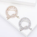 Circular Faux Pearl Wreath Brooch with Crystal Leaf Accents view 1