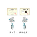 Silver Tone Floral Stud Earrings With Detachable Leaf And Blue Vase Drops view 3