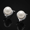 Faux Pearl Silver Tone Stud Earrings Curved Metal CZ Accent view 2