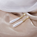 Long White Pearl Teardrop Drop Earrings Gold Cone Cap view 3