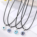 Silver Tone Round Evil Eye Black Cord Pendant Necklaces view 1