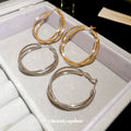 Twisted Double Hoop Earrings in Gold and Silver Tones view 2