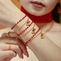Double Layer Garnet Christmas Hat Necklace and Bracelet in Gold Tone view 4