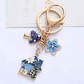Gold-Tone Enamel House Charm Keychain with Mushroom and Flower view 6