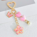 Pink Heart Clasp Keychain with Iridescent Hearts and Glitter Flower Charm view 9