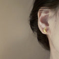 Textured Gold Croissant Crescent Stud Earrings With Metal Details view 2