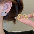 Gold and Silver Tone Open Rocking Horse Stud Earrings view 1