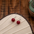 Deep Red Round Bead Silver Tone Dangle Hook Earrings view 2
