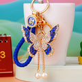 Jeweled Butterfly Keychains in Four Colors with Pearl Drop Tassels view 1
