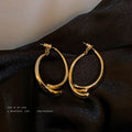 Gold Sculpted Double Layer Hoop Statement Earrings view 4