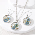 Round Pressed Blue Flower Resin Necklace and Earring Options view 1