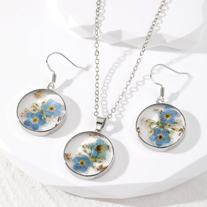 Round Pressed Blue Flower Resin Necklace and Earring Options