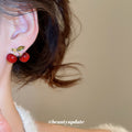 Glossy Red Cherry Stud Earrings With Green Leaf Accents view 3