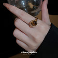 Three Mixed Statement Rings With Brown Crystals Green Or Brown Stones view 4