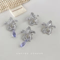 Silver Textured Iris Flower Stud Earrings Open Petal Pair view 3
