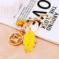 Yellow Leaf and Coin Charm Keychains with Fifteen Braided Strap Options view 2