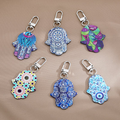 Main product view of silver Tone Printed Hamsa Acrylic Clip Keychains in Six Designs