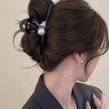 Black Sculptural Loop Hair Claw With Pearl Like Orb And Clear Crystal view 4