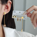 Gold Tone Three Pair Disc Stud Hoop and Long Crystal Drop Earring Set view 4