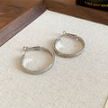 Slim Metal Hoop Earrings in Gold and Silver Tone Size Options view 6
