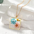Gold Tone Pressed Flower Resin Pendant Necklaces in Eleven Shapes view 10