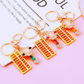 Ruyi Abacus Keychains in Red Gold and Green with Clasp and Braided Loops view 2