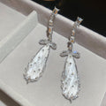 Clear Faceted Teardrop Earrings with Crystal Bow Tops view 6