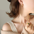 Irregular C Shape Earrings With Faux Pearls And Clear Stones view 1