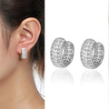 Pavé Wide Huggie Hoop Earrings in Gold and Silver Tones view 1