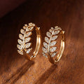 Leaf Motif Hoop Earrings In Three Polished Metal Tones view 6