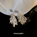 Silver Tone Leaf Tassel Earrings with Gray Pearl Tops view 4