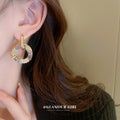 Gold Tone Hoop Earrings With Iridescent Crystal Fans view 4