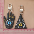 Silver Tone Black Triangle and Hamsa Eye Clip Keychains view 4