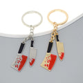 Gold and Silver Tone Blood Splatter Knife Split Ring Keychains view 1