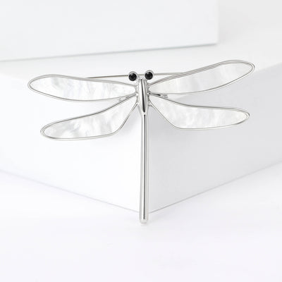 Minimal dragonfly shown from the front
