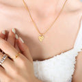 Gold Heart Pendant Snake Chain Necklace Three Clear Stones view 4