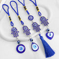Silver-Tone Hamsa Hand Evil Eye Charm With Braided Cord view 1