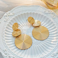 Gold Triple Spiral Disc Geometric Statement Stud Earrings view 3