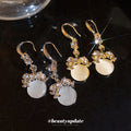 Round Cabochon Drop Earrings with Floral Metal Details view 3